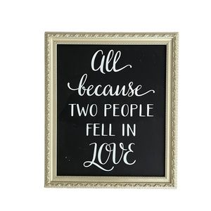 Wall decor “all because two people fell in love”